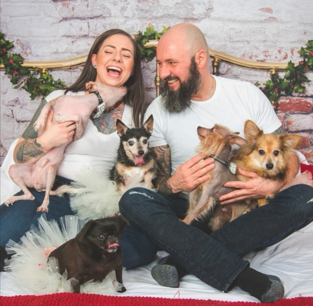 Caitlin & Ken, & their five rescues dogs